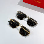 Two pairs of sunglasses with dark lenses and slim frames, gold-tone and silver-tone