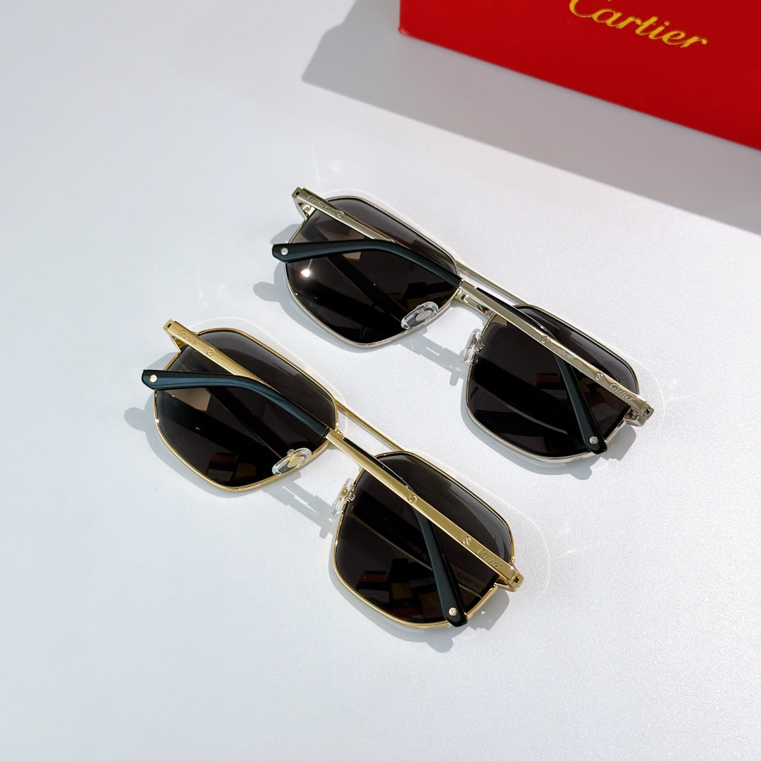 Two pairs of sunglasses with dark lenses and slim frames, gold-tone and silver-tone