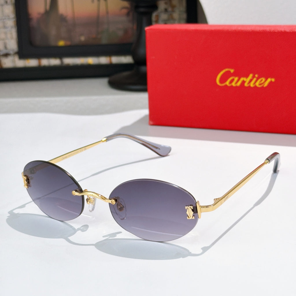 Cartier round sunglasses with gold frame and bluish gray tinted lenses