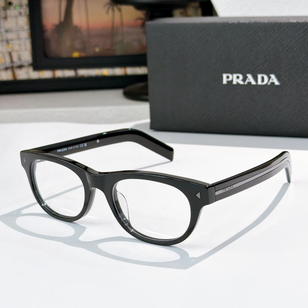 Prada eyeglasses with black frames and clear lenses