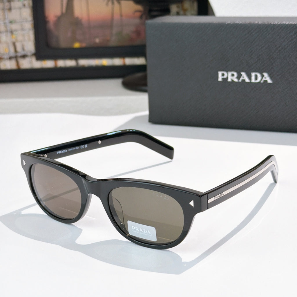 Prada sunglasses with black frames and dark brown lenses