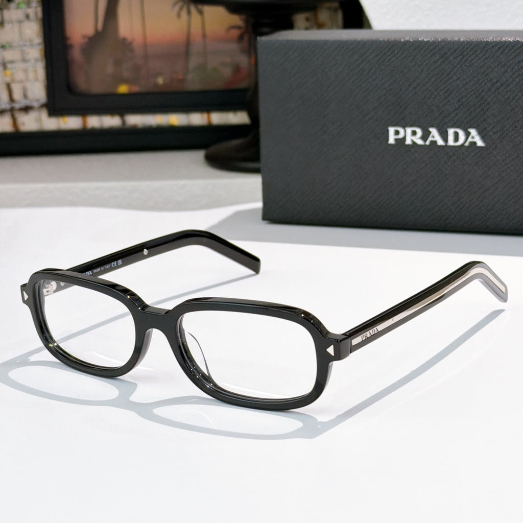 Prada eyeglasses with black frames and clear lenses