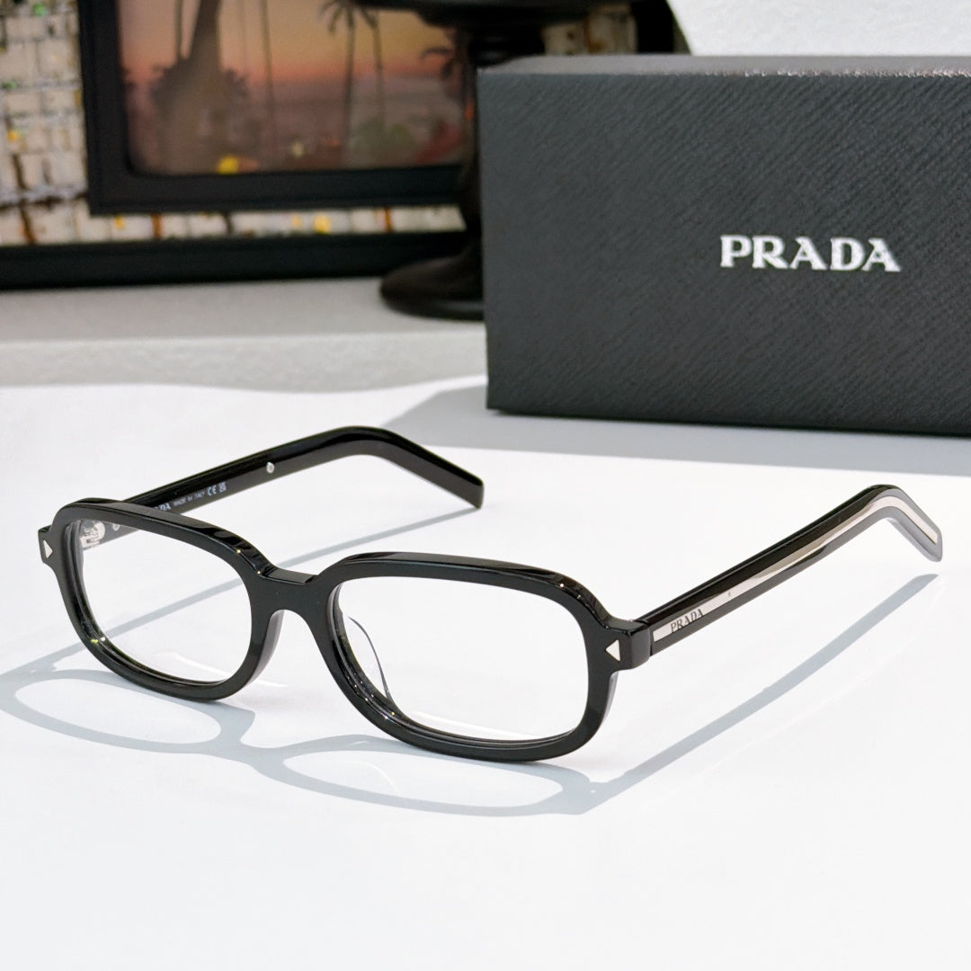 Prada eyeglasses with black frames and clear lenses