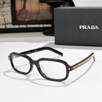 Prada eyeglasses with black frames and clear lenses with gold accents