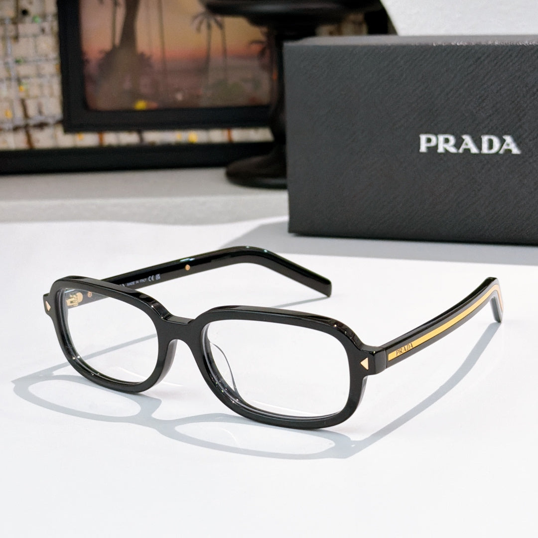 Prada eyeglasses with black frames and clear lenses with gold accents