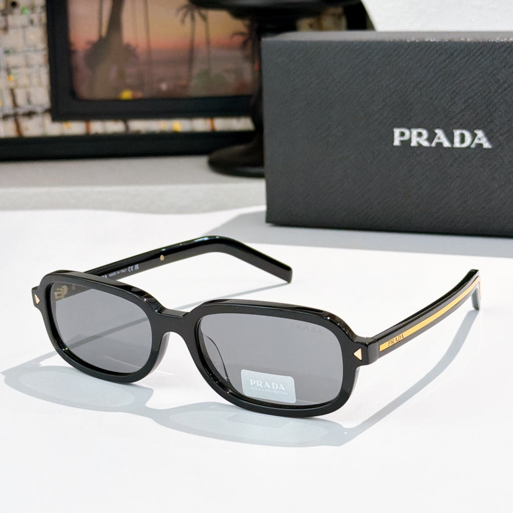 Prada sunglasses with black frames and gray-tinted lenses