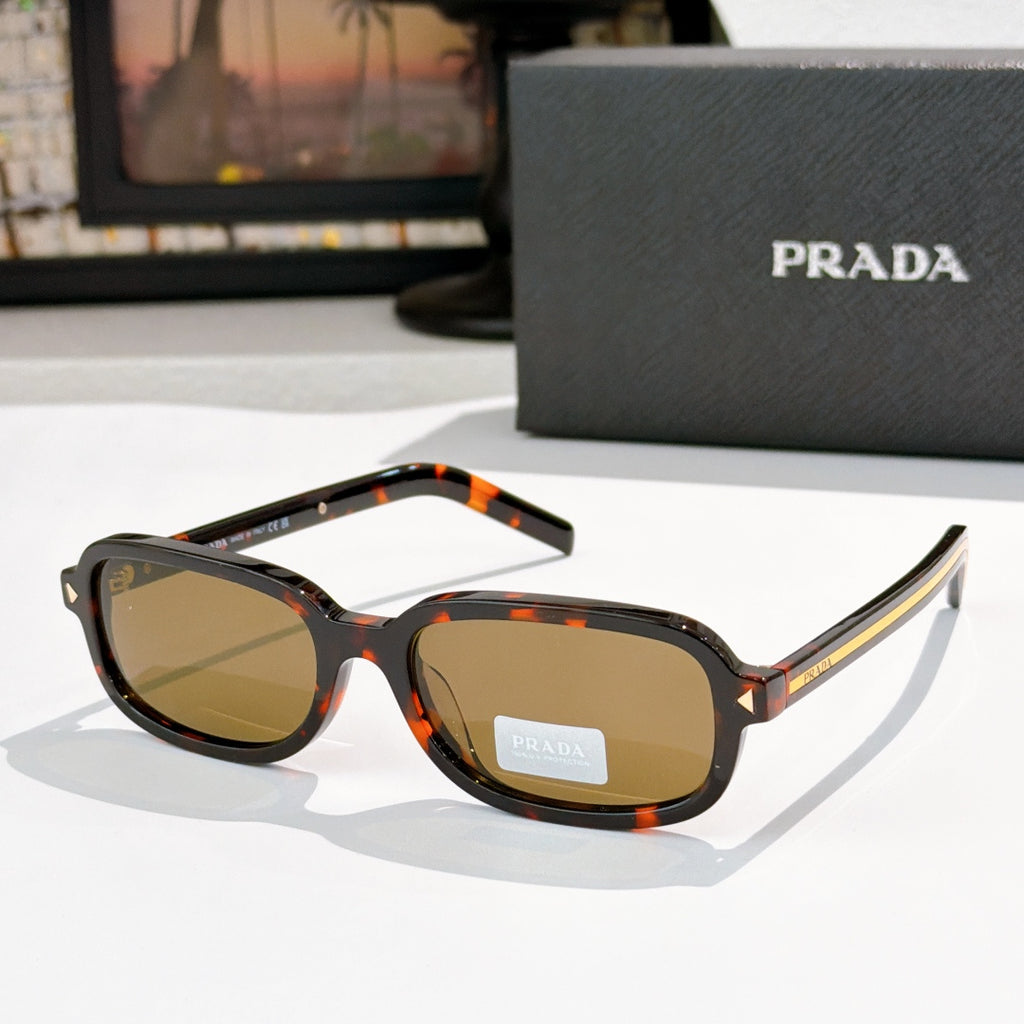 Prada sunglasses with tortoiseshell frames and brown-tinted lenses