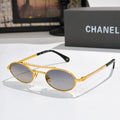 Gold round sunglasses with dark lenses, pearl chain detail on temples