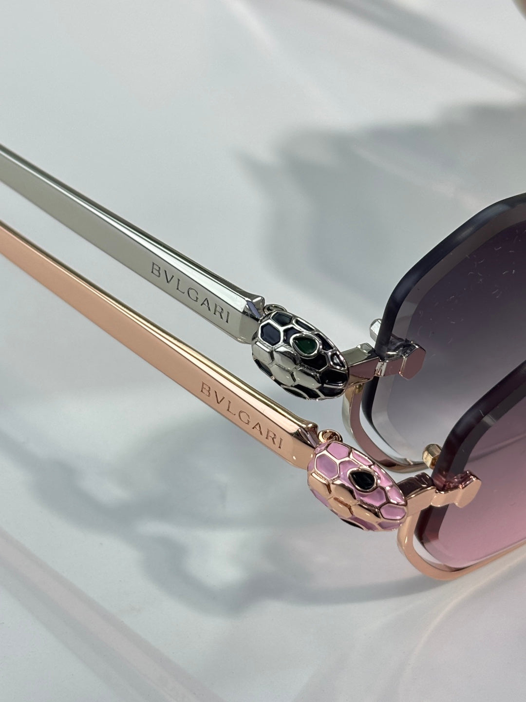 Sunglasses close-up of patterned metal temple and pink hinge detail with BVLGARI