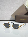 Octagonal Bvlgari sunglasses with gold-tone frame and dark lenses