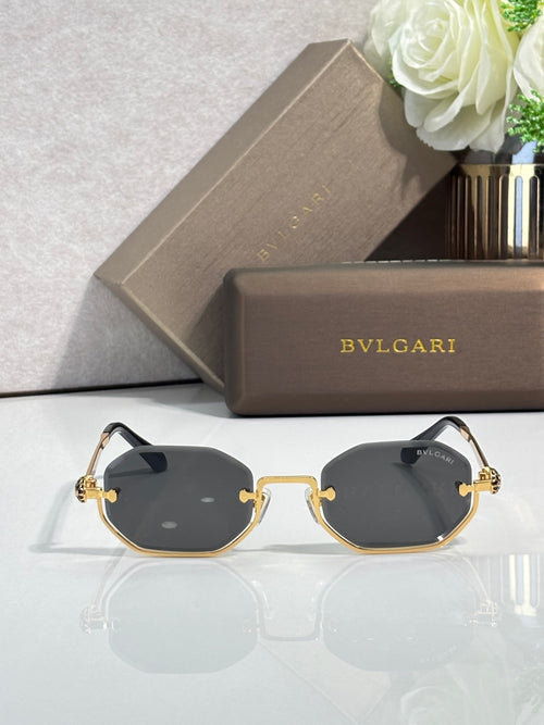 Octagonal Bvlgari sunglasses with gold-tone frame and dark lenses