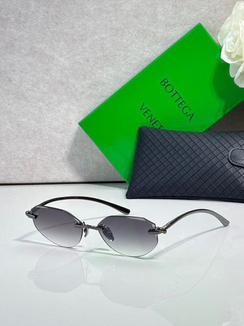 Bottega Veneta sunglasses with dark gray lenses and black metal frame, slim temples