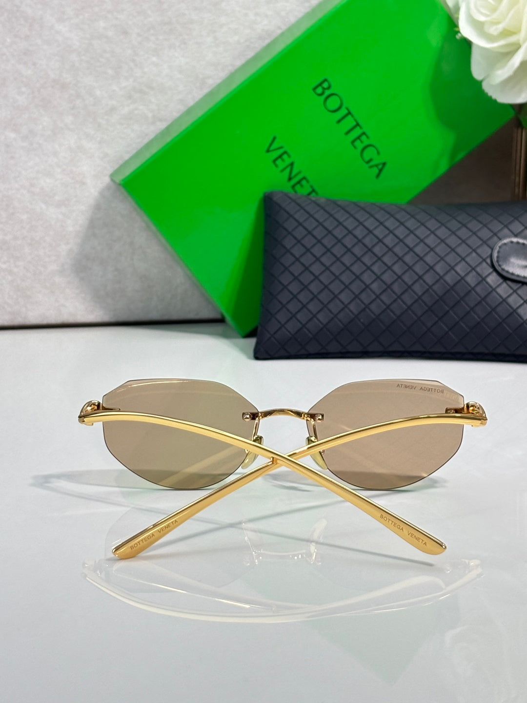 Bottega Veneta gold-tone cat-eye glasses with brown lenses
