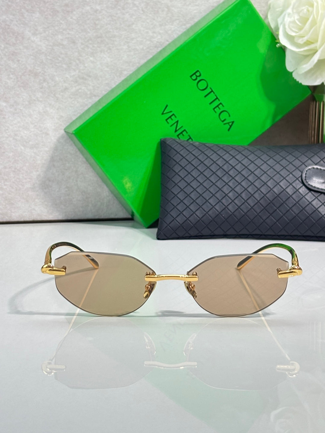 Bottega Veneta gold-tone round-bridge glasses with brown lenses
