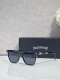 Chrome glasses with dark navy square frames and tinted lenses, metal hinge detail