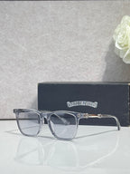 Chrome glasses with clear frames and dark lenses, chrome temple details