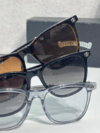 Chrome glasses with dark and clear frames, rounded lenses and chrome temple accents