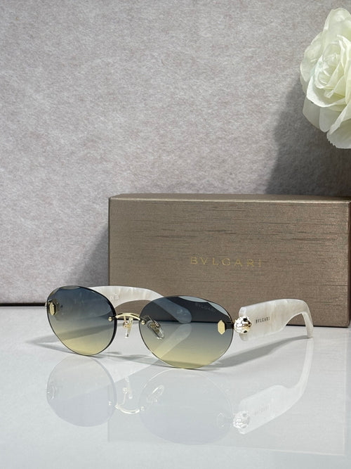 Sunglasses with gradient lenses, white temples, and gold-tone logo hardware