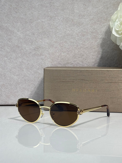 Gold-tone round sunglasses with dark tinted lenses and thin metal temples