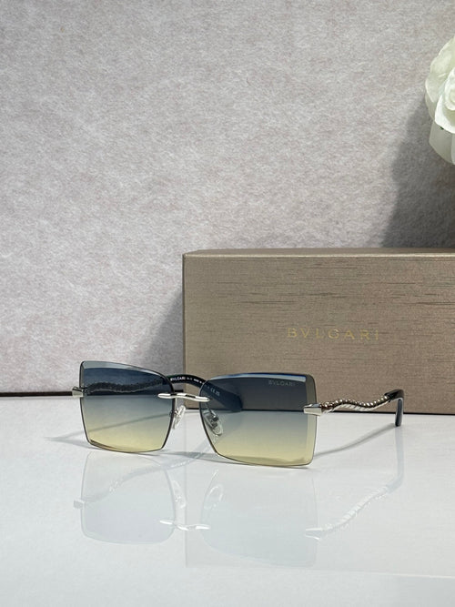 Bvlgari rectangular sunglasses with gold frame and blue gradient lenses