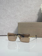 Bvlgari rectangular sunglasses with gold frame and warm brown lenses