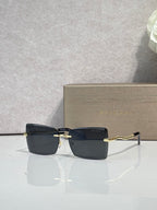 Bvlgari rectangular sunglasses with gold frame and dark gray lenses