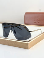Shield sunglasses with black frame and dark blue gradient lenses