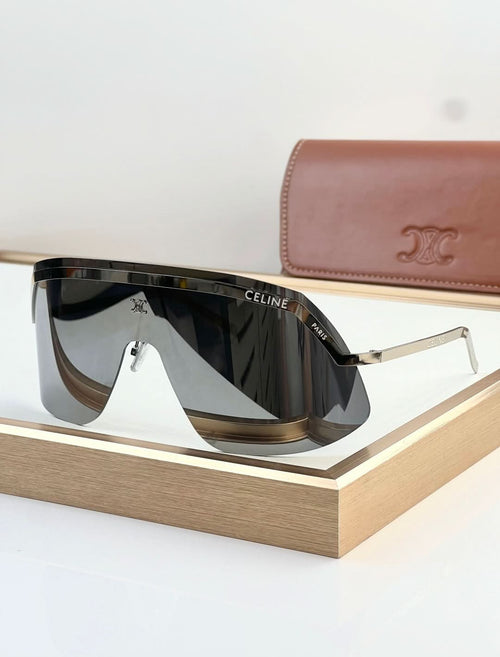 Shield sunglasses with black frame and dark smoke mirrored lenses