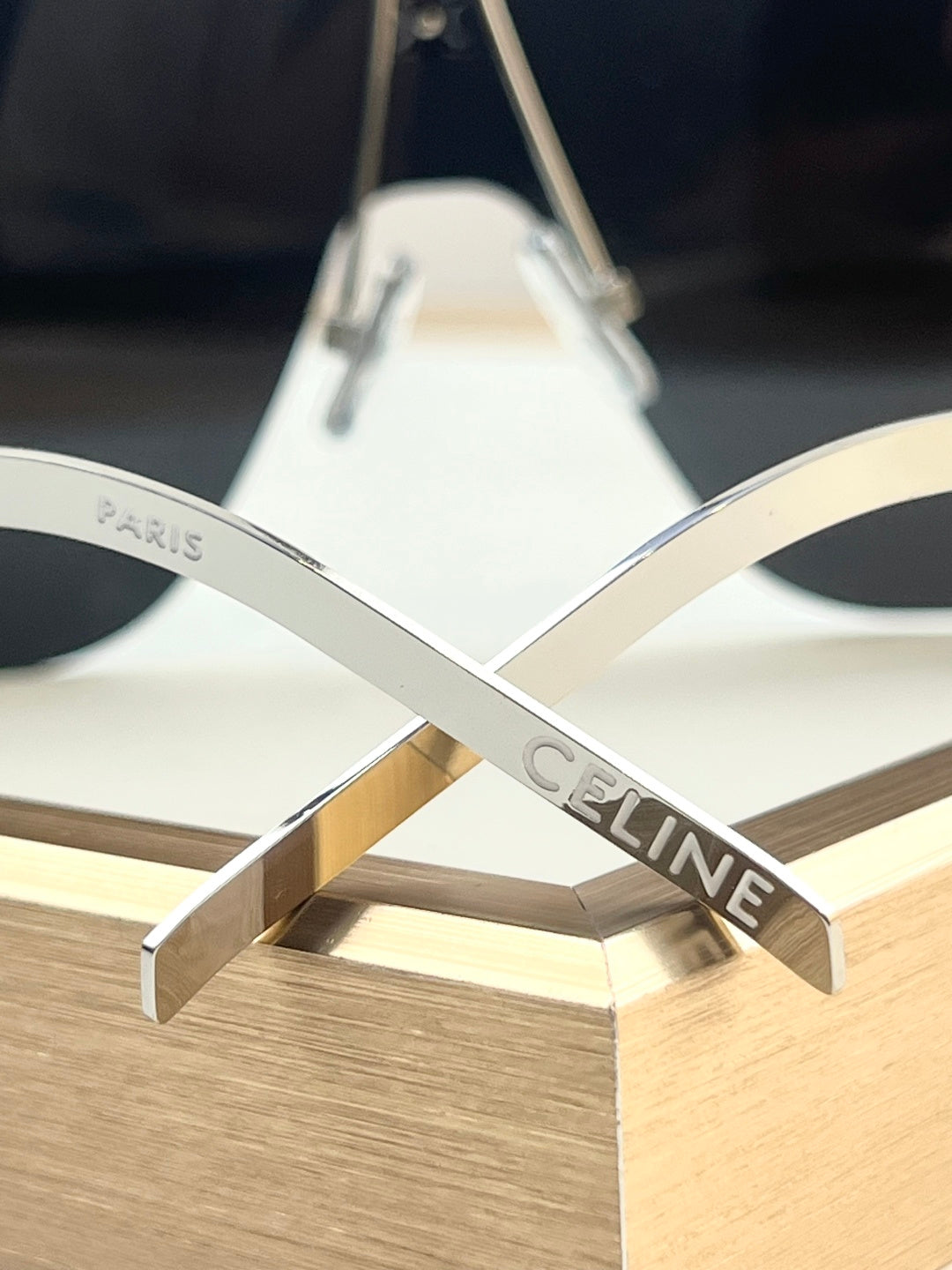 Metal sunglasses frame bridge with Celine engraving on the arm