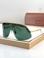 Shield sunglasses with black frame and dark green gradient lenses