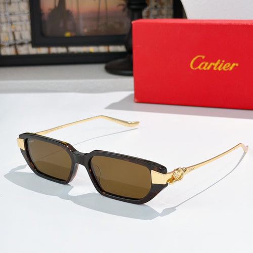 Black and gold sunglasses with brown-tinted lenses, cat-eye style