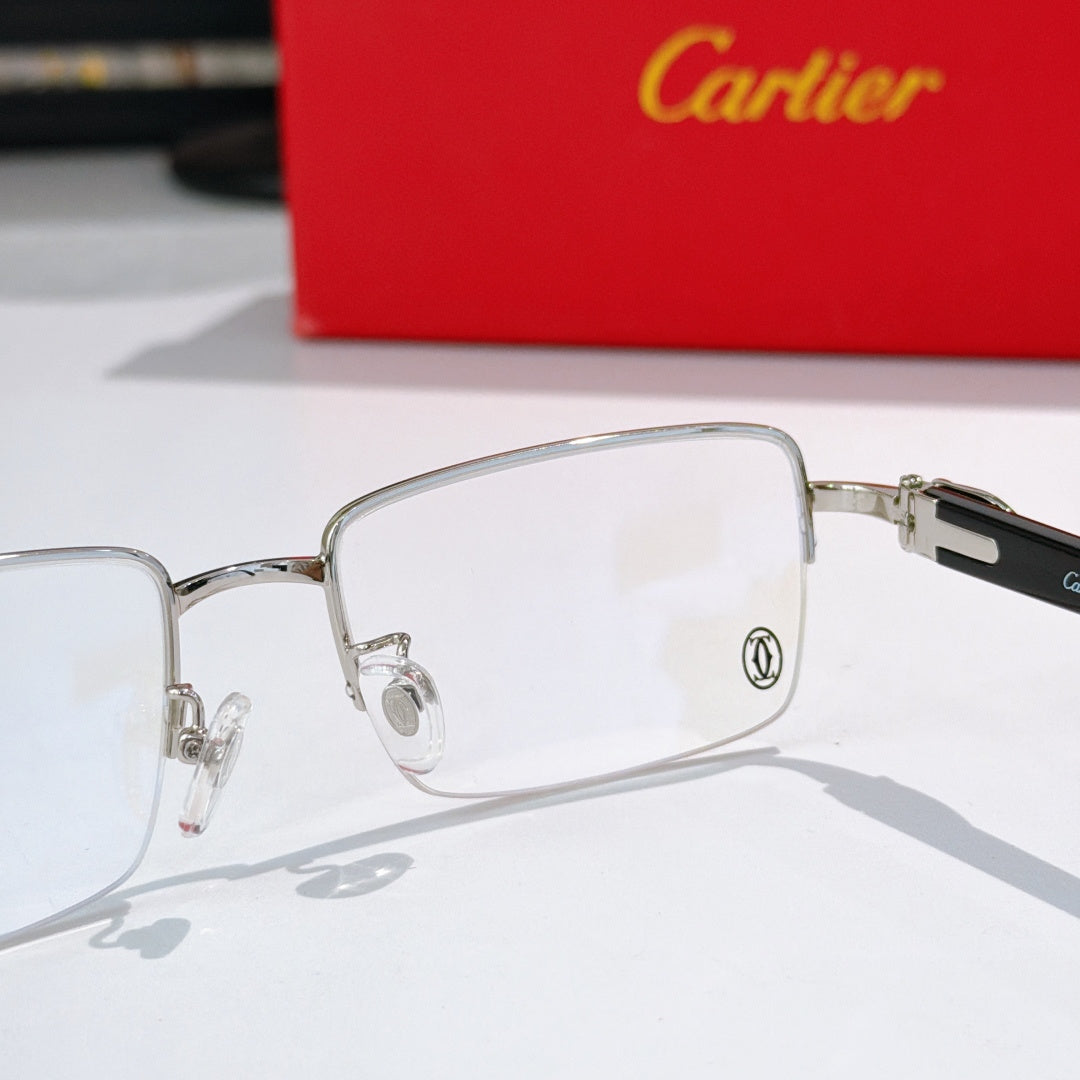 Cartier eyeglasses with silver frame and clear lenses, front close-up detail.