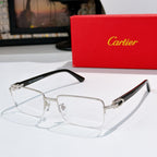 Cartier eyeglasses with silver frame and clear lenses, dark temple detail visible.