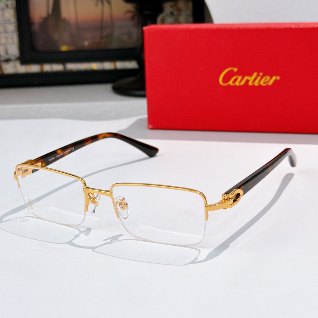 Cartier eyeglasses with gold frame, clear lenses, and tortoiseshell temple section.