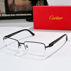 Cartier eyeglasses with black frame and clear lenses, side temple detail visible.