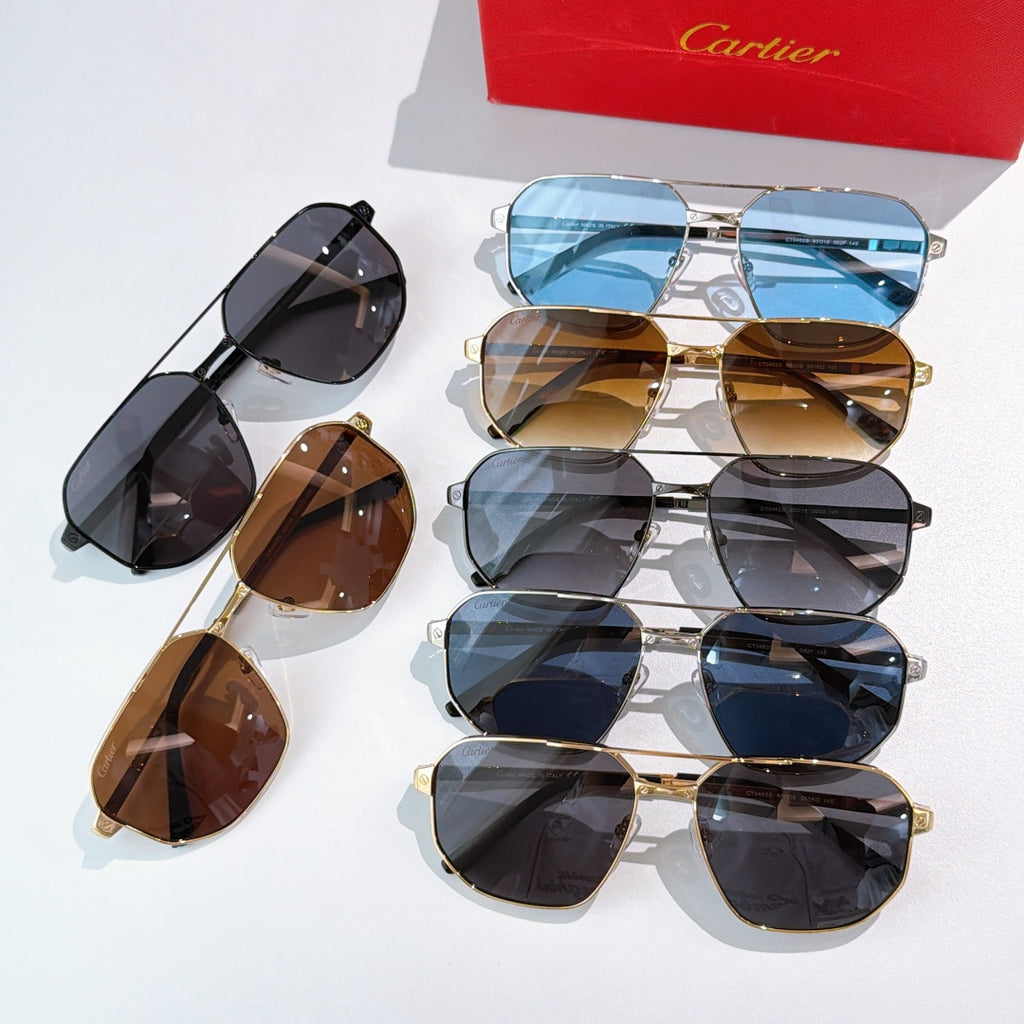 Cartier sunglass assortment: mixed frames with blue, brown, and black lenses.