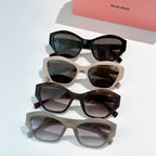 Multi-pair cat-eye sunglasses with black, cream, tortoise, and light frames