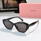 Black cat-eye sunglasses with dark tinted lenses and glossy frame