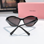 Black cat-eye sunglasses with dark tinted lenses and sculpted center bridge