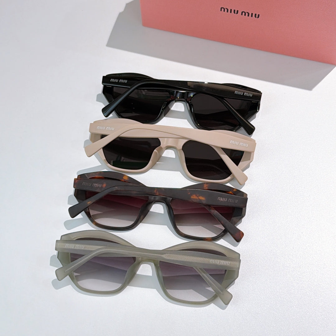 Assorted cat-eye sunglasses set with black, cream, and tortoise frames