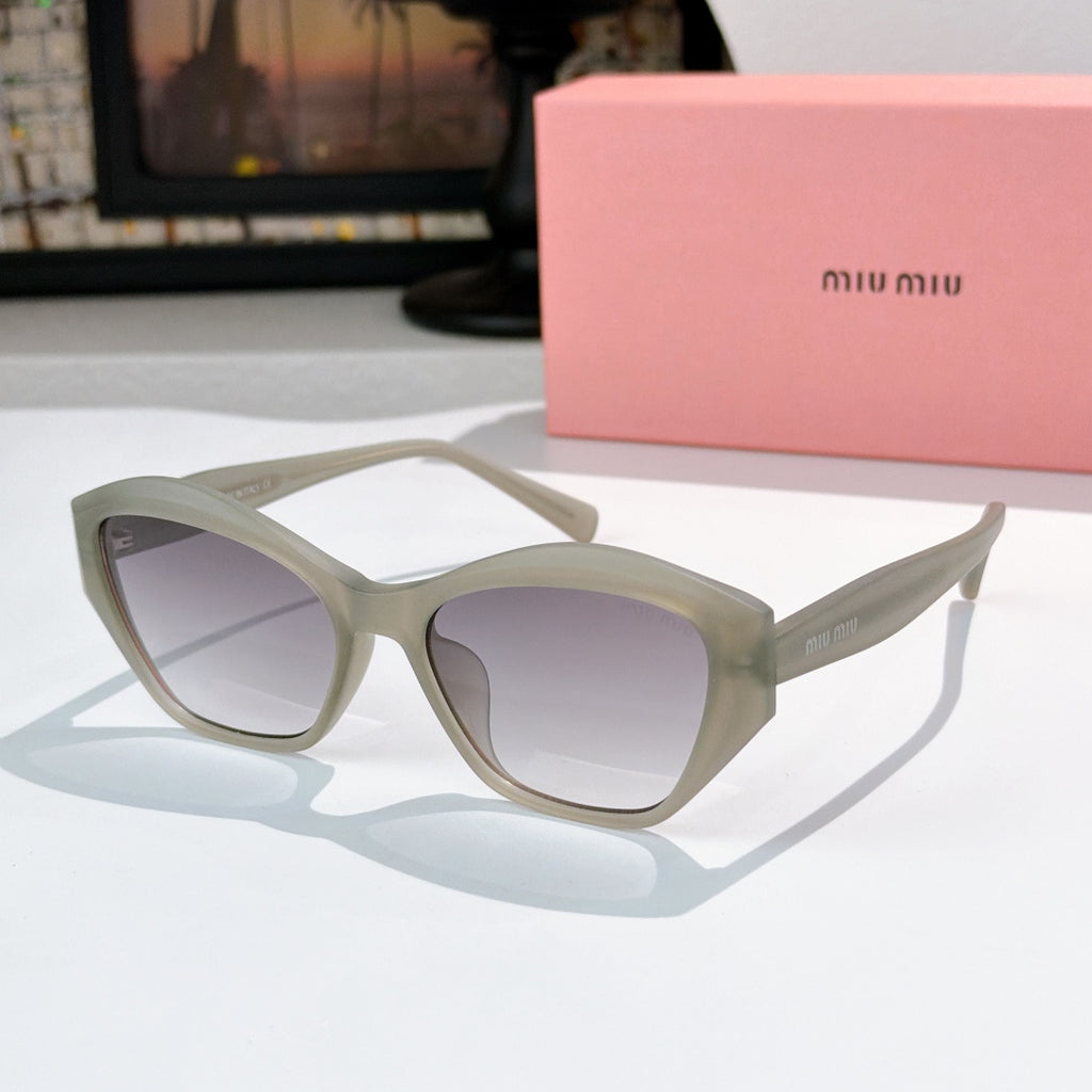 Light gray cat-eye sunglasses with pale tinted lenses and glossy frame