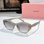 Light gray cat-eye sunglasses with pale tinted lenses and glossy frame