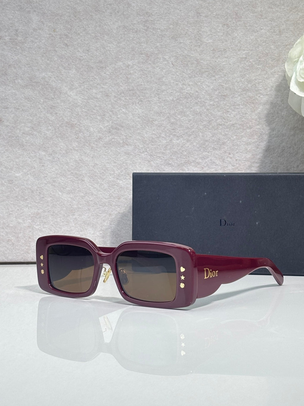 Dior sunglasses with burgundy frame and dark gray square lenses