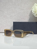 Dior sunglasses with gold-tone frame and dark brown square lenses