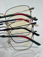 Gucci optical glasses set, mixed green and red striped temples, clear lenses