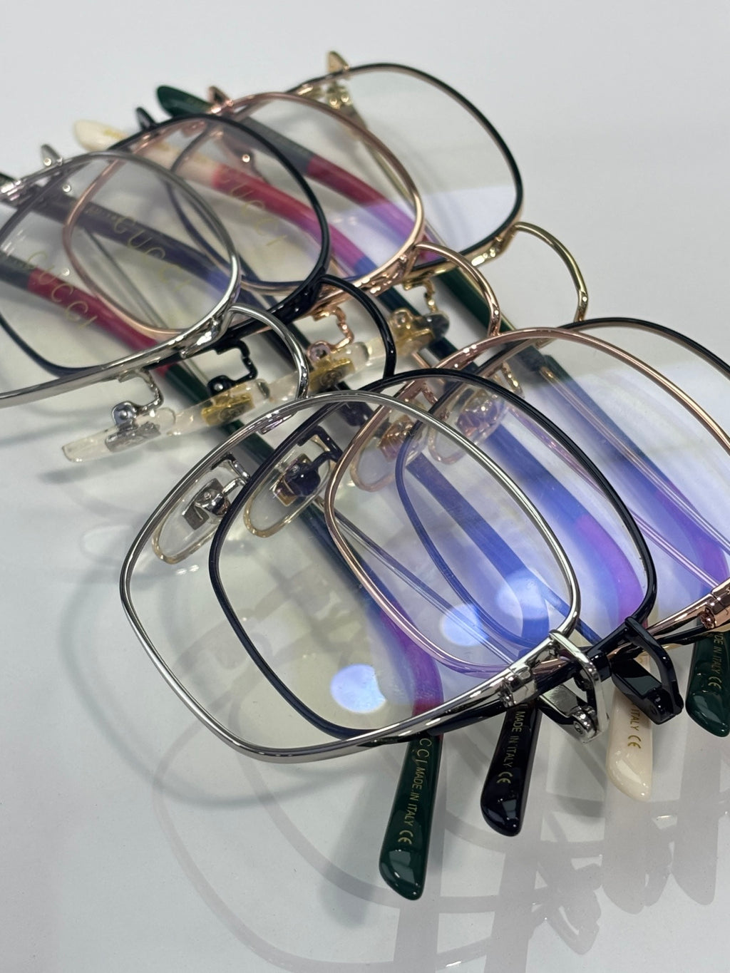 Assorted Gucci optical glasses frames, clear lenses in silver and blue shades