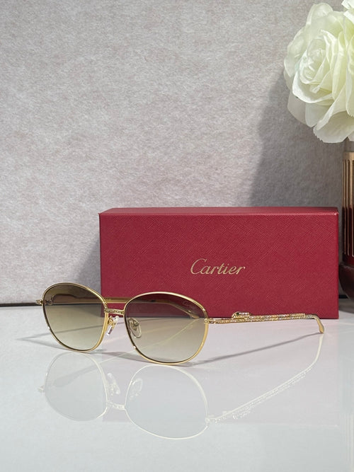 Gold-tone round glasses with brown-tinted lenses and gold bridge