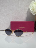 Gold-tone round sunglasses with dark tinted lenses and thin metal frame