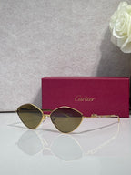 Gold-tone round sunglasses with dark smoke tinted lenses and slim metal frame