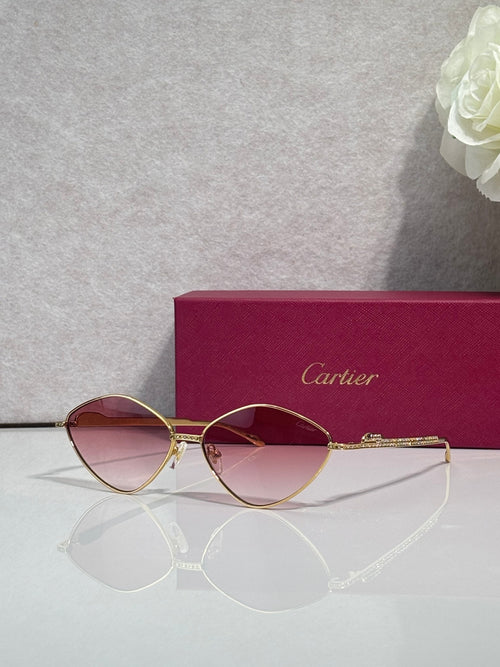 Gold-tone round sunglasses with pink-to-purple gradient tinted lenses